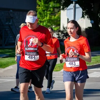 Bronte Harbour Classic 5K 2026 official race photo: Course, Emily H., Mercedes-Benz Oakville, Oakvest Group.
