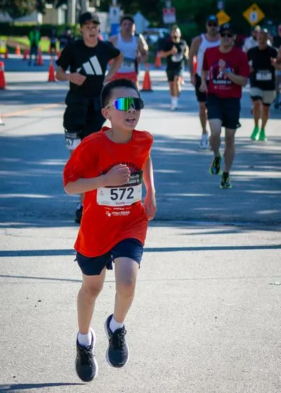 Bronte Harbour Classic 5K 2026 official race photo: Course, Zachary L., Speak Squad, Festival.