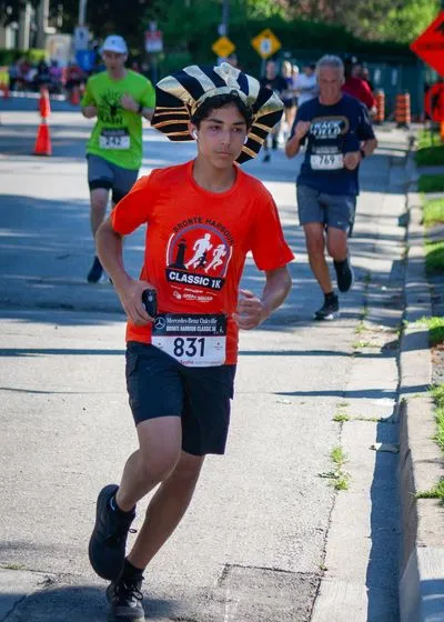 Bronte Harbour Classic 5K 2026 official race photo: Course, Hassan S., Mercedes-Benz Oakville, Speak Squad.