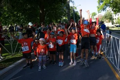 Bronte Harbour Classic 5K 2026 official race photo: Kids 1K, Bib 1, Speak Squad, Kids Area, Festival.