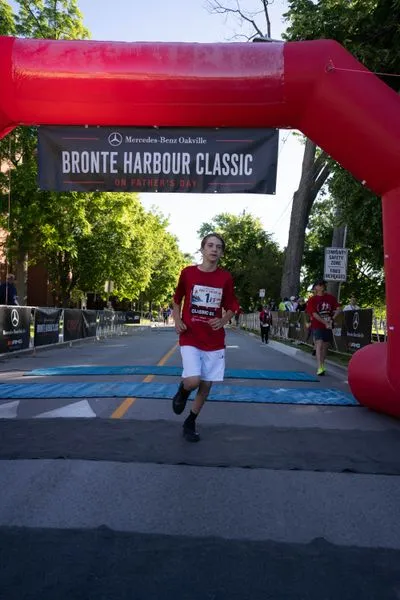 Bronte Harbour Classic 5K 2026 official race photo: Kids 1K, Bib 1, Mercedes-Benz Oakville, CIBC, Speak Squad.