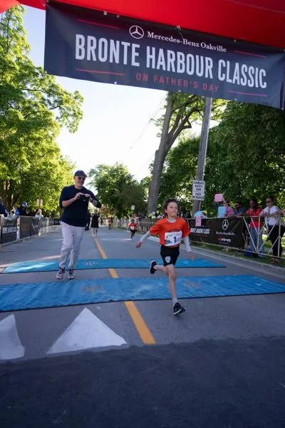 Bronte Harbour Classic 5K 2026 official race photo: Kids 1K, Bib 1, Mercedes-Benz Oakville, CIBC, Be Active Physio, Speak Squad.