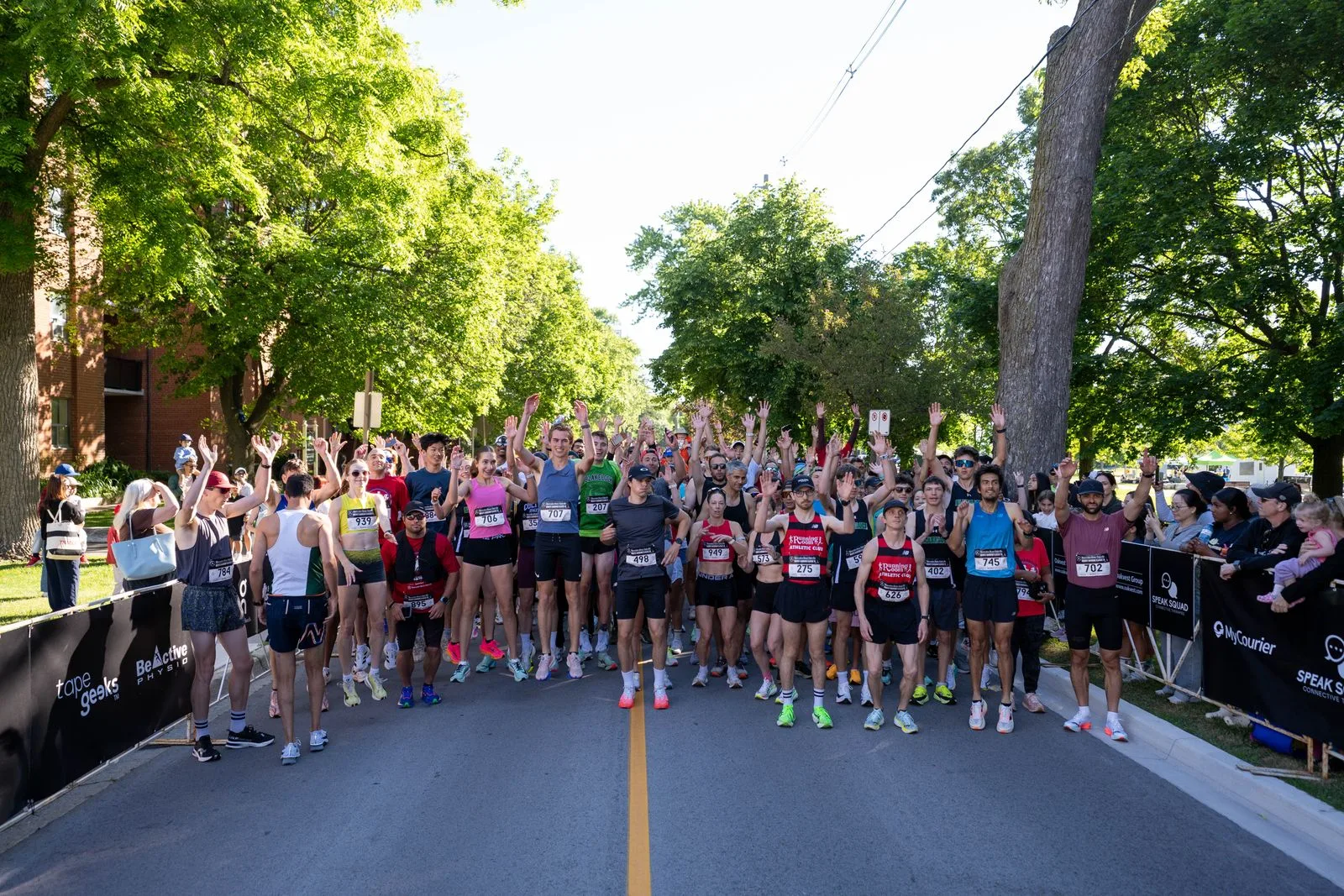 Runner reviewing Bronte Harbour Classic race information and FAQ for the June 20, 2027 event in Oakville