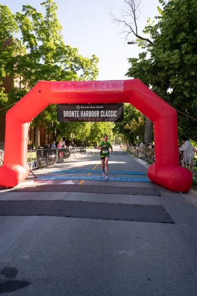 Bronte Harbour Classic 5K 2026 official race photo: Finish Line, Declan A., Mercedes-Benz Oakville, TapeGeeks, Kids Area.