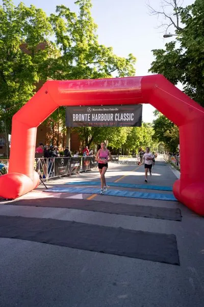 Bronte Harbour Classic 5K 2026 official race photo: Finish Line, Carson C., Mercedes-Benz Oakville, CIBC, Be Active Physio, TapeGeeks, Kids Area.