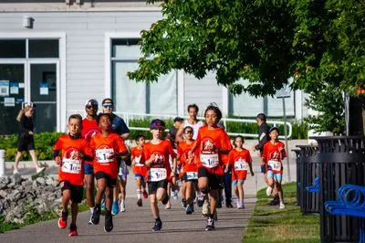Bronte Harbour Classic 5K 2026 official race photo: Kids 1K, Bib 1, Speak Squad.