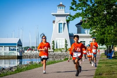 Bronte Harbour Classic 5K 2026 official race photo: Kids 1K, Bib 1, Speak Squad.